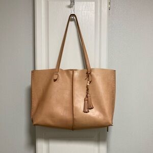 The Sak Tan Vachetta Leather Tote Bag.